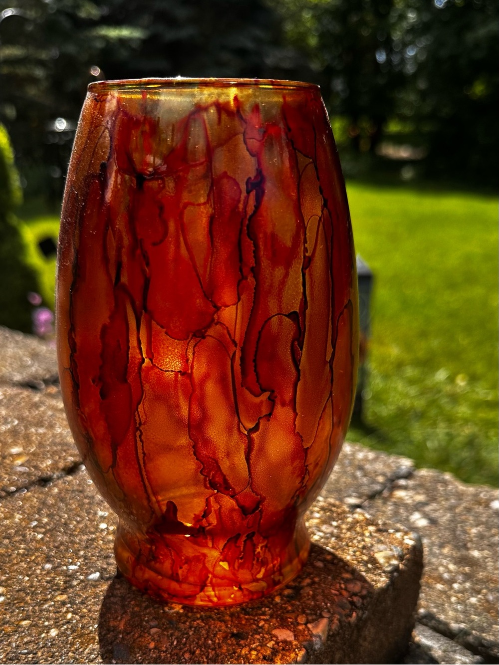 Hand crafted brown orange artisan glass vase painted with alcohol inks